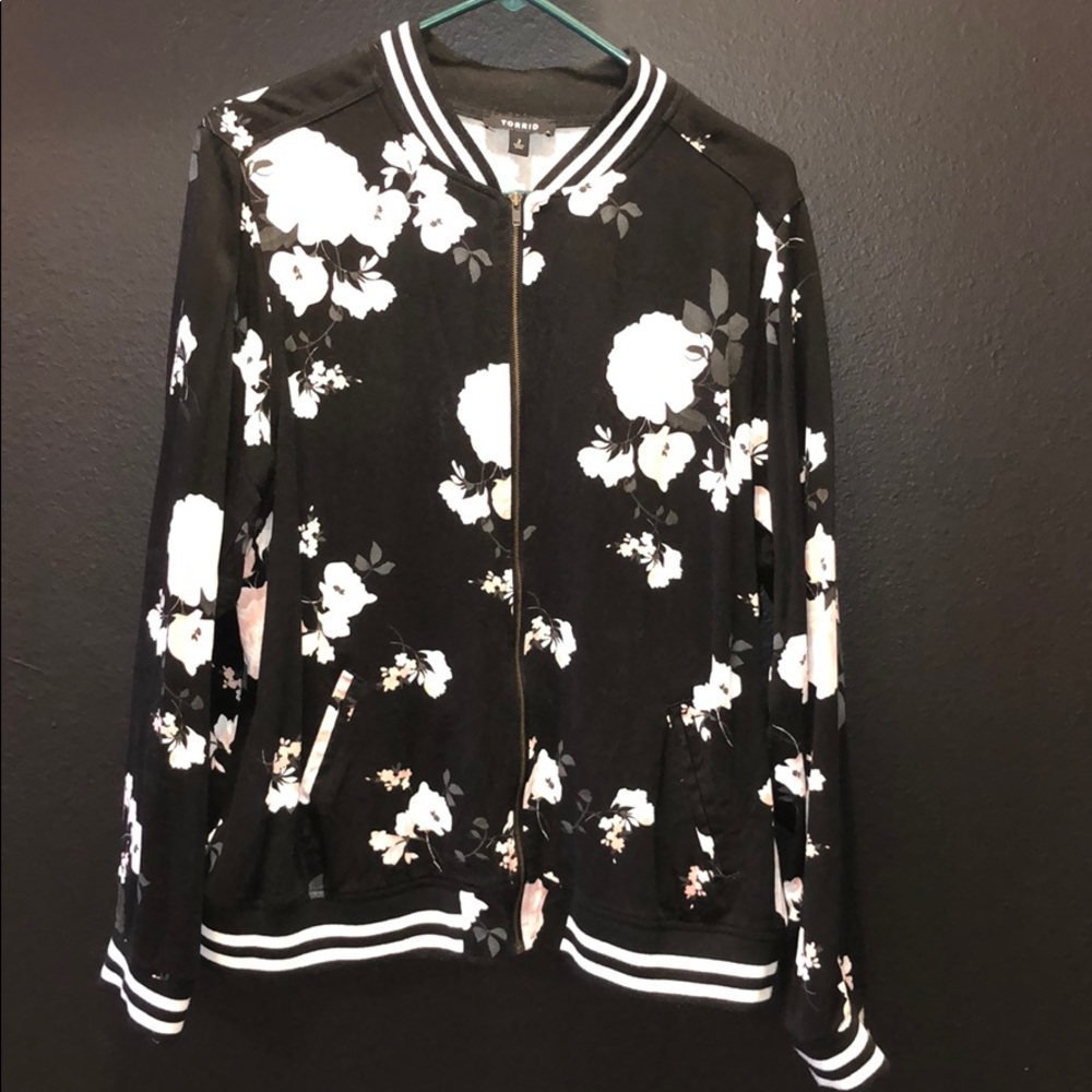 Flowered zip up jacket.